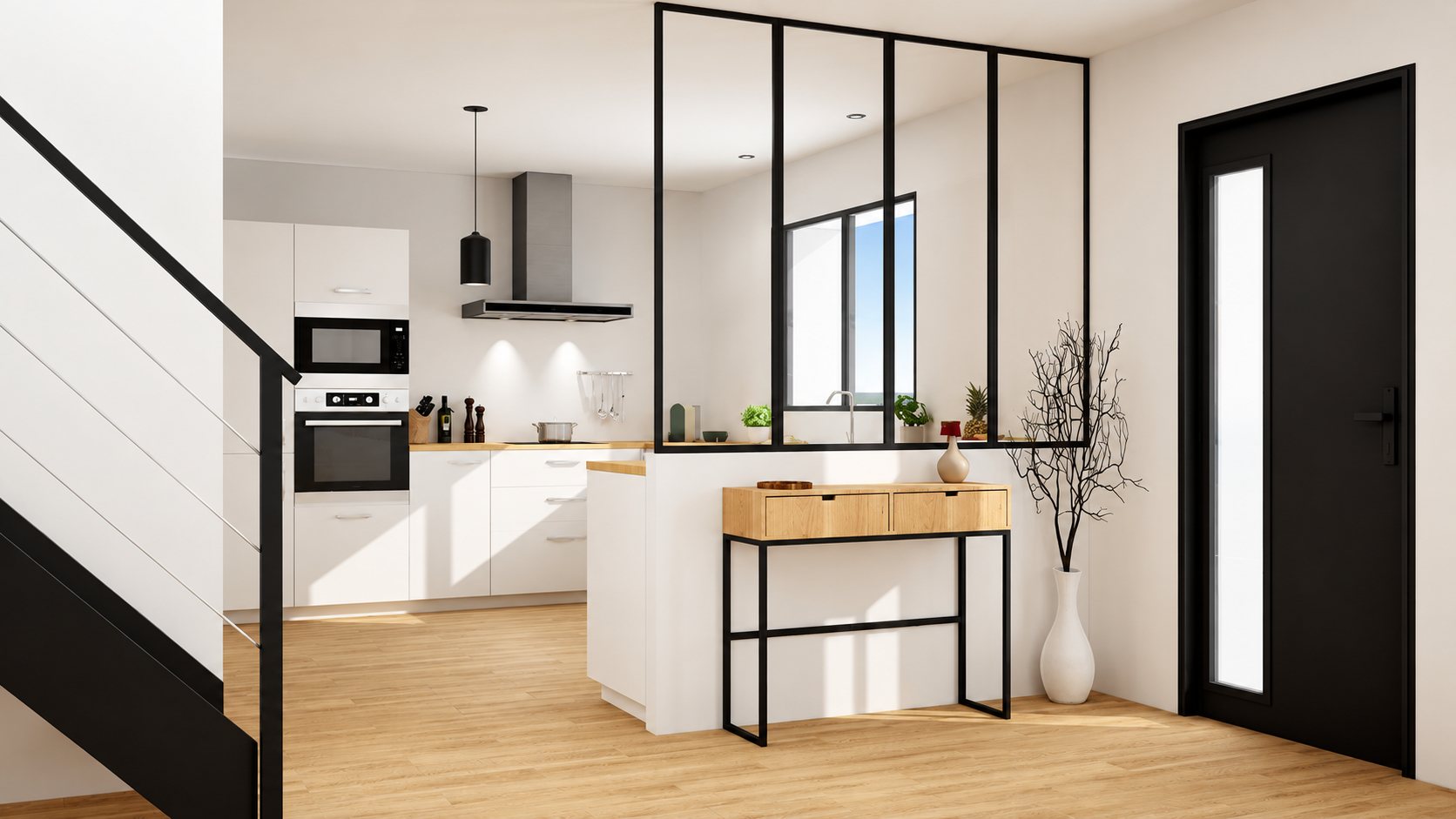 Intérieur lumineux avec une cuisine blanche ouverte séparée par une verrière noire, une console en bois, un escalier et une porte d'entrée noire.